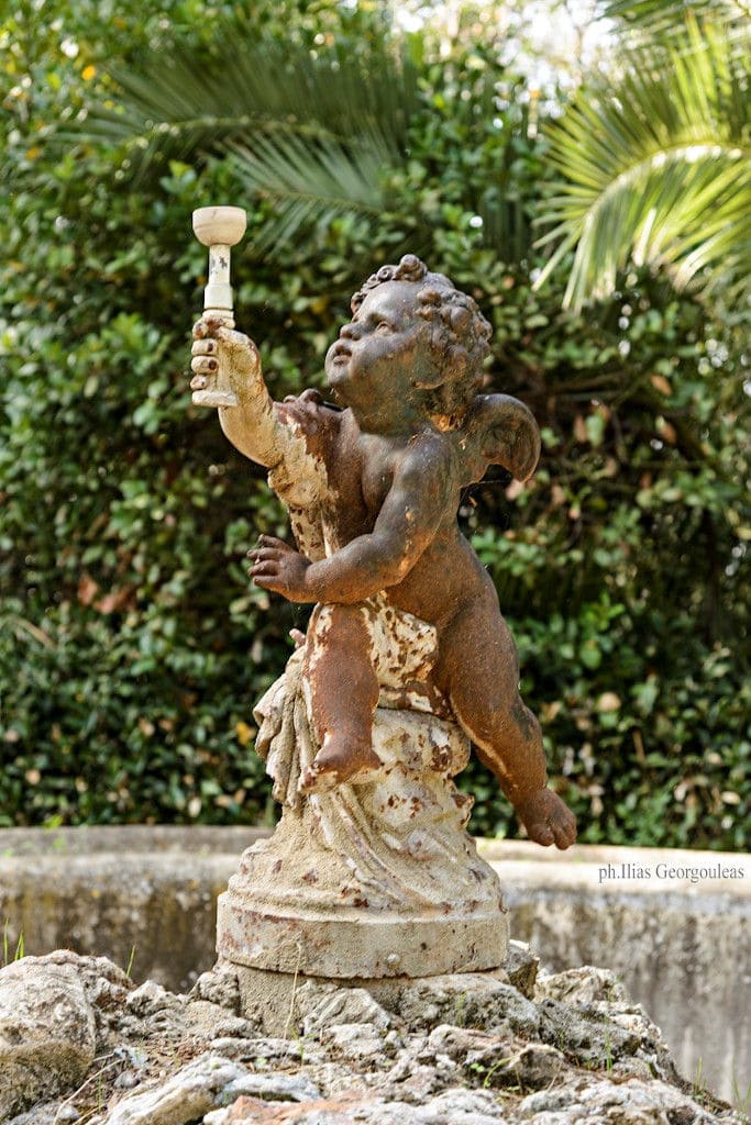 angel water fountain into Pyrgos Vasilissis winery garden
